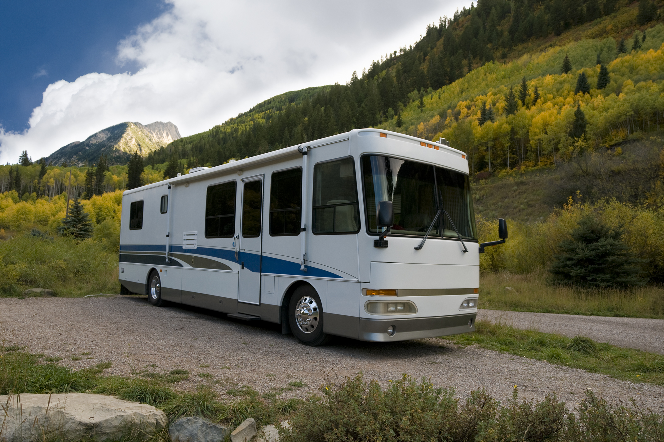 prevent mold in your RV - Class A motorhome parked in the mountains