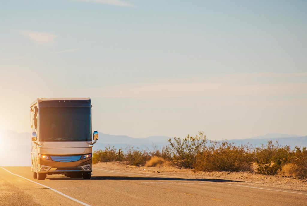 driving a motorhome - RV Motorcoach Road Trip. Class A Diesel Pusher on the California Deseret Highway. Travel in Style. United States of America.