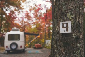 Camper camping at RV park in autumn in North Carolina Blue Ridge Mountains outside of Asheville.