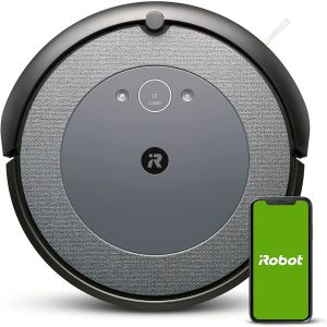 Roomba vacuum and connected smartphone. 