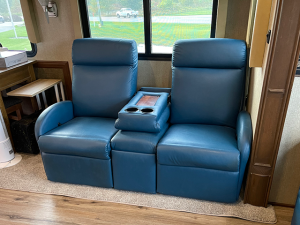 Blue theater seats installed by Bradd and Hall.