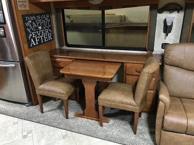 Credenza dinette RV tables on display in a motorhome. 