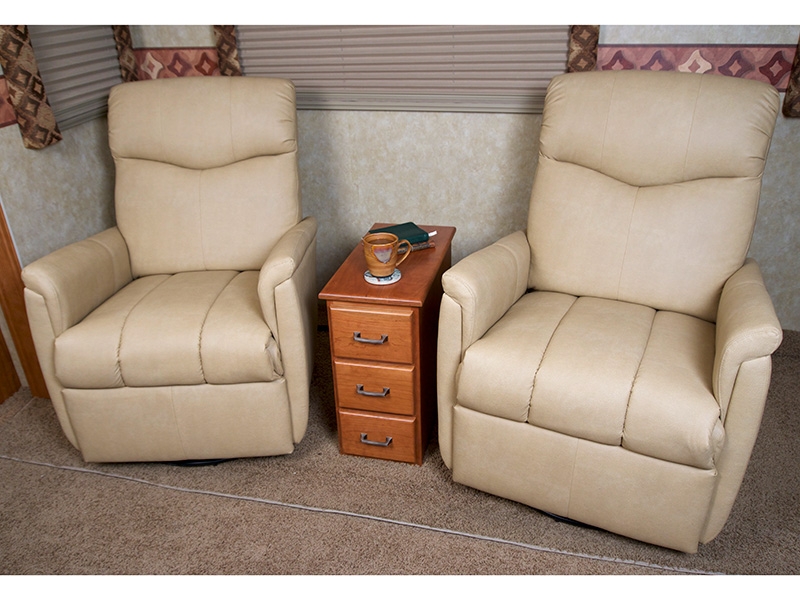 The standard size cubby cabinet, one of our RV tables, between two arm chairs. 