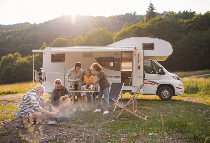 A family tries renting your RV as they set up outside of a Class C.
